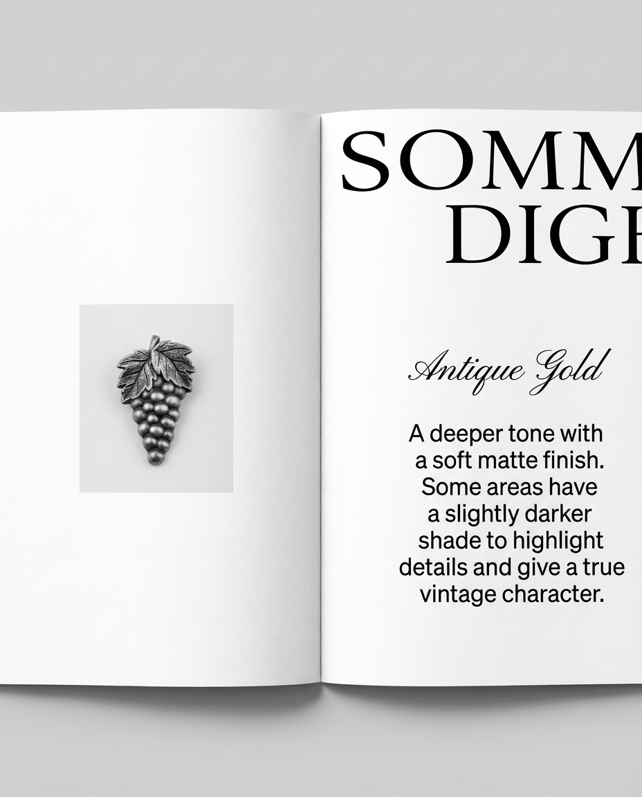 Antique silver sommelier pin with grape cluster design showing the matte finish preferred in wine service